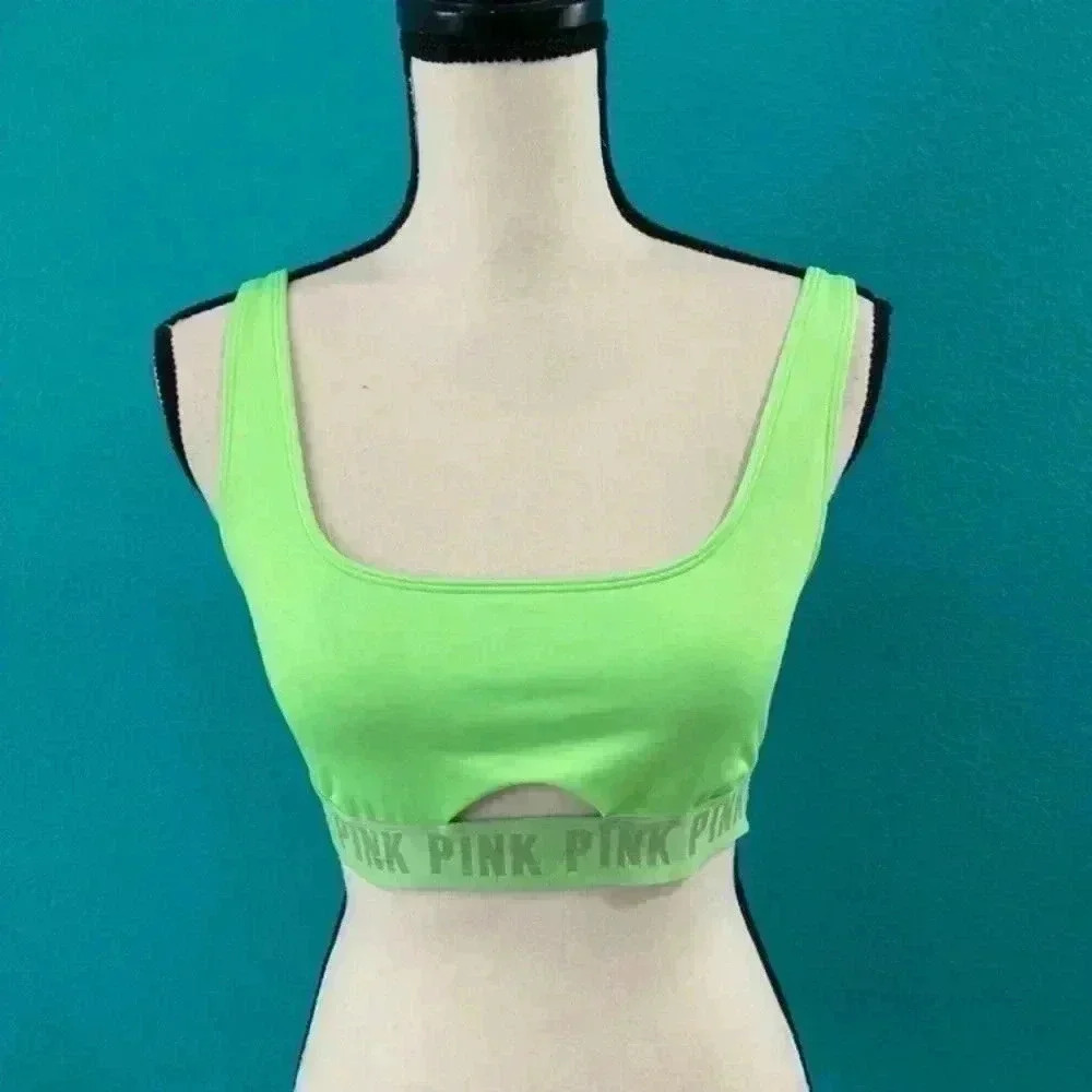 Victoria’s Secret sport pink neon green sports bra in size medium